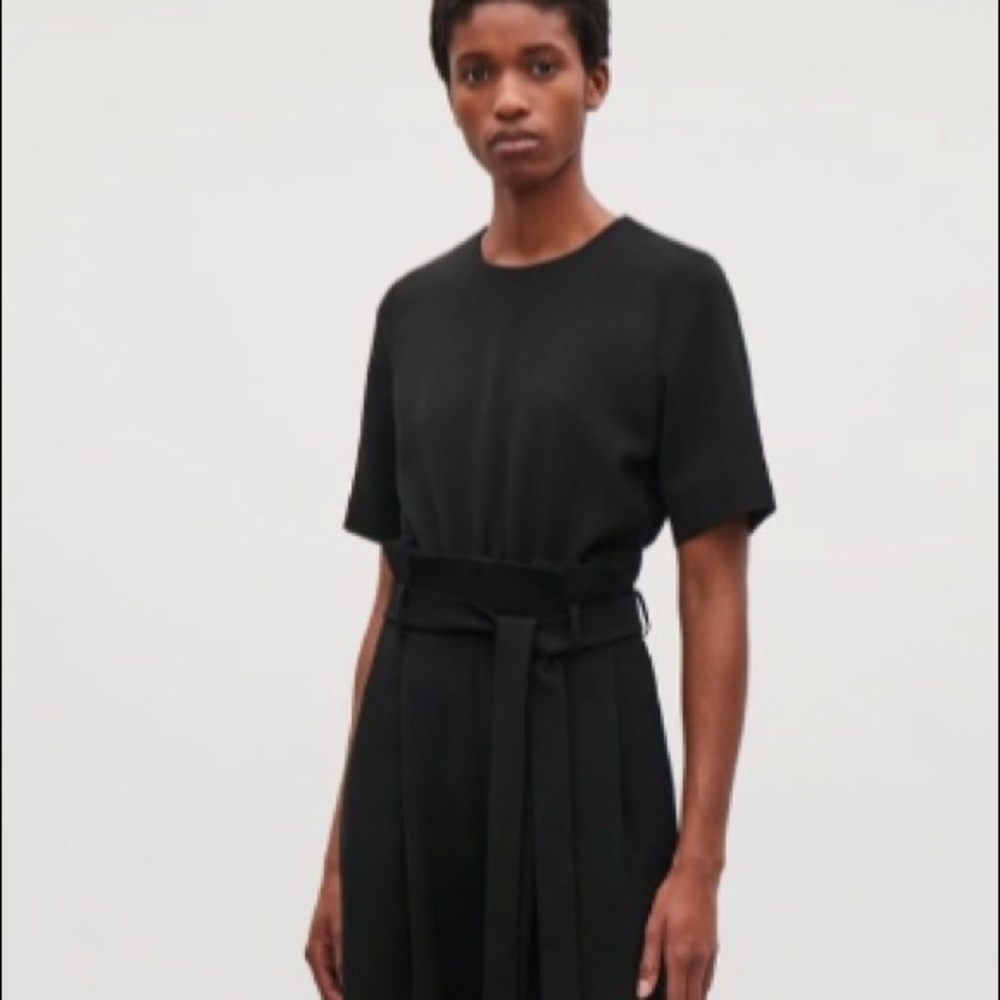 Black Cos jumpsuit. Never worn. Short sleeve